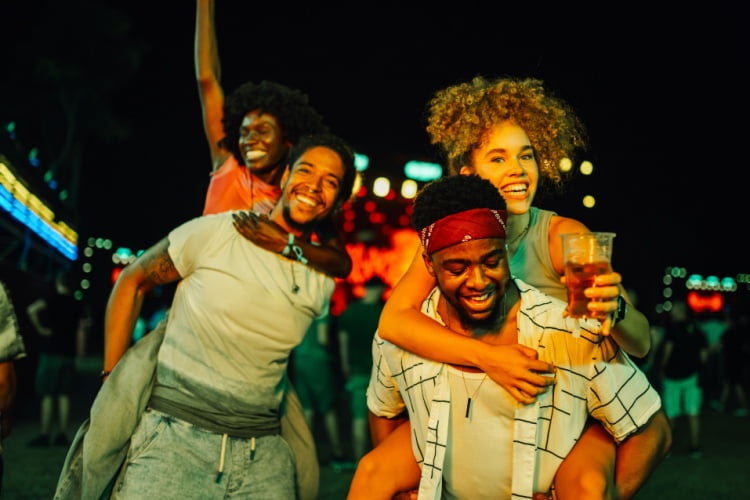 Four haplpy San Diego festival attendees